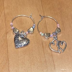Set of 2 different heart wine charms. Valentine love perfect gift.